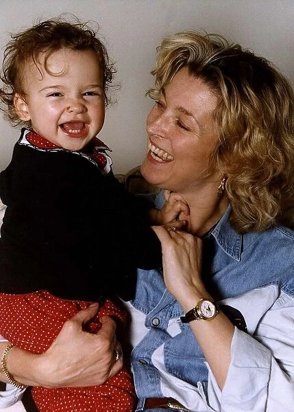 Gillian Taylforth Actress holding her daughter