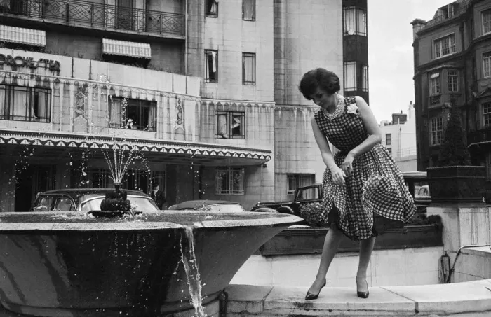 Framed Print : Gina Lollobrigida, Italian actress, poses for pictures outside the Dorchester Hotel