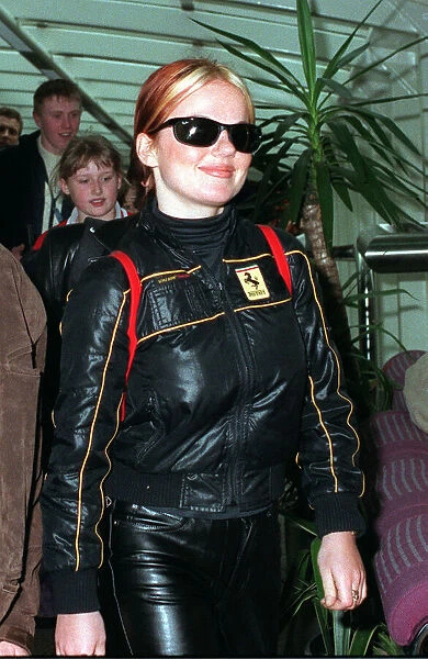 GINGER AT GLASGOW AIRPORT APRIL 1998 Spice Girls wearing a black jacket