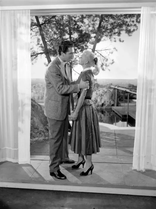 Framed Print : Ginger Rogers with husband Jacques Bergerac in a scene from the the film Lifetime