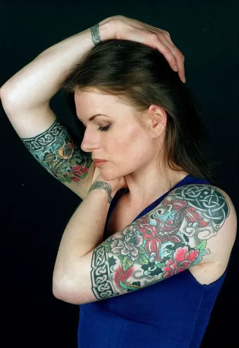 Framed Print : Girl with coloured tattoos on her arms. April 1996 Framed Print : Girl with coloured tattoos on her arms. April 1996