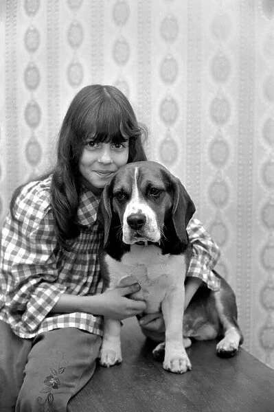 Girl and dog: Maxine Solvey and Beagle Shandy. March 1975 75-01260-002