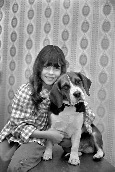 Girl and dog: Maxine Solvey and Beagle Shandy. March 1975 75-01260-001