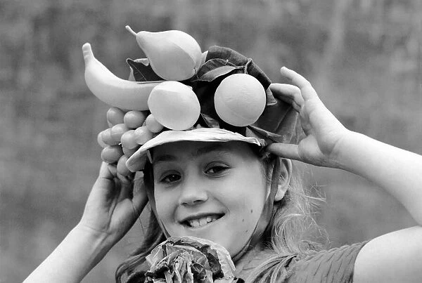 Girl  /  Hat  /  Unusual: Trinidad Carnival in Kensington. February 1975 75-00811-003