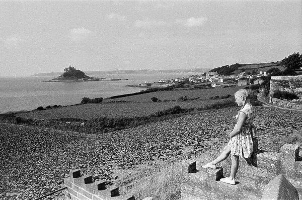 A girl looking out to St Michaels Mount, Cornwall, September 1968