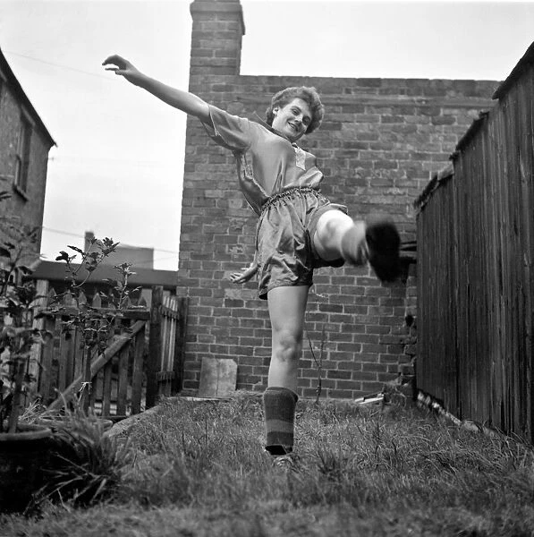 Girl soccer player Margaret Parkes. 1956 A509-003
