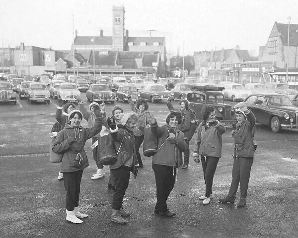 Girls of Barkers Butts School, Coventry, wave a cheery farewell before leaving Pool