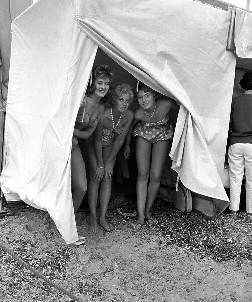Girls in a bathing hut, Clacton. 23rd July 1960