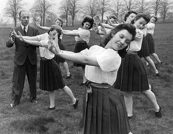 Girls from the Czech youth movement Sokol in Britain, performing fitness exercises in