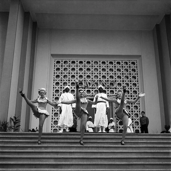Girls dancing on the steps of the casino in Marrakech, Morocco December 1952