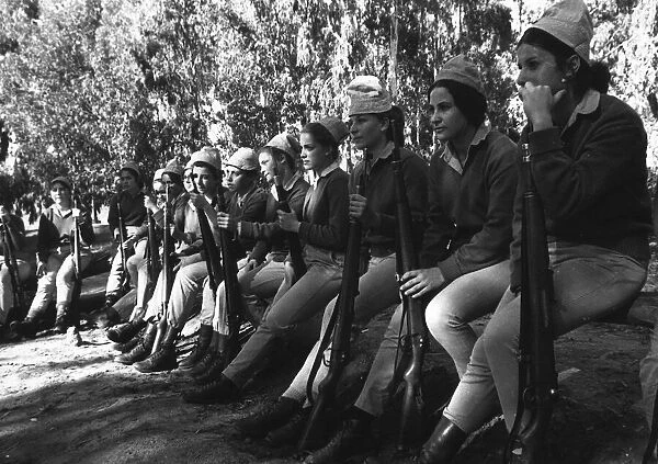 the girls of the Israeli Army listen to a lecture during their basic training