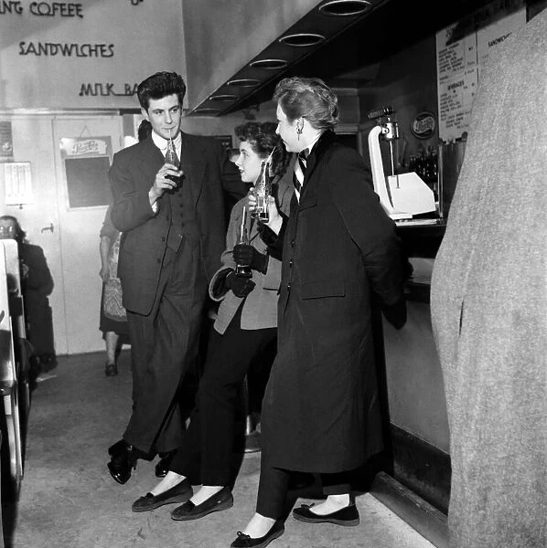 Girls meet up with friends at a coffee bar in Londons West End. November 1953 D7092
