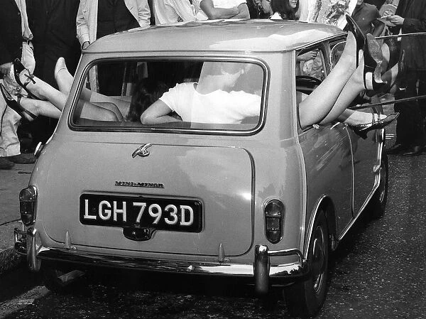 Fifteen girls packed themselves into a mini car in 1966 in London