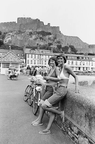 Girls on the promenade in St Helier on the Channel Island of Jersey