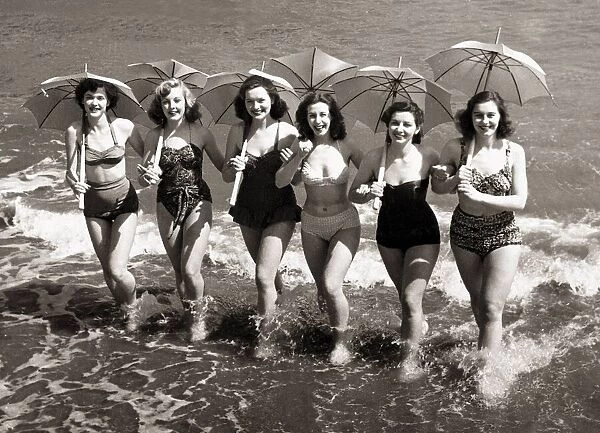 Girls from the show Revels of 1951 splashing in the sea at Sandown Isle of Wight