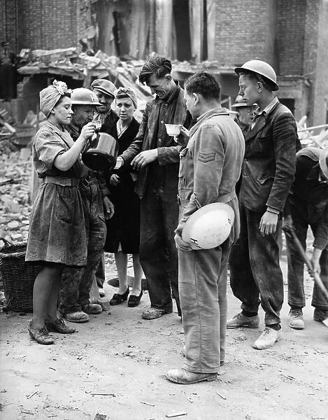 Girls soon made tea for the rescue workers. Deptford. June 1944 P009364