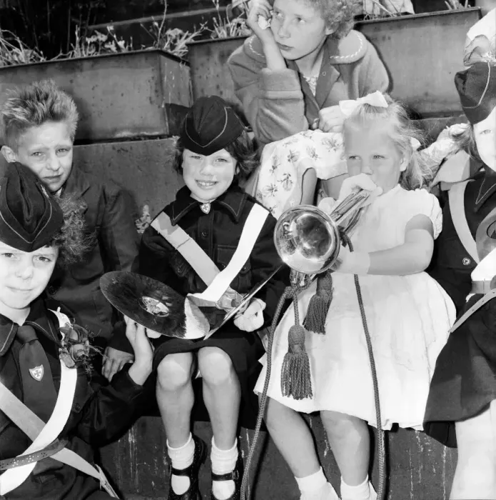 Framed Print : To girls taking part in the Manchester Whit Walks try their hand at the trombone