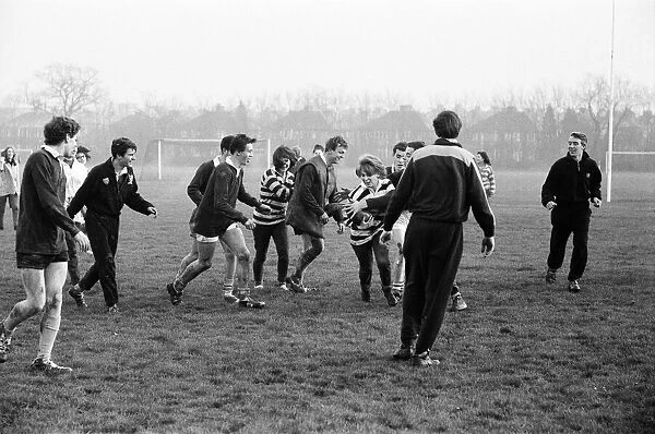 Girls versus boys rugby match between students of North West London Polytechnic at