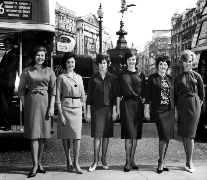 Framed Print : Six girls wearing the latest Marks and Spencer clothes pose at Piccaddilly Circus in Framed Print : Six girls wearing the latest Marks and Spencer clothes pose at Piccaddilly Circus in