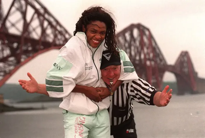 Framed Print : Gladiator Rocket ( Pauline Richards) gets a head lock on referee John Anderson with Framed Print : Gladiator Rocket ( Pauline Richards) gets a head lock on referee John Anderson with