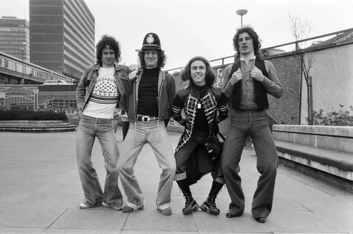 Framed Print : Glam rock group Slade posing for pictures in Birmingham City Centre. 25th March 1977 Framed Print : Glam rock group Slade posing for pictures in Birmingham City Centre. 25th March 1977