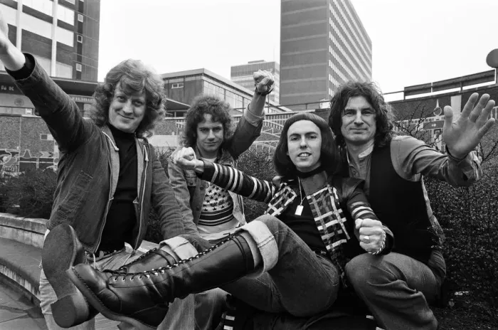 Framed Print : Glam rock group Slade posing for pictures in Birmingham City Centre. 25th March 1977 Framed Print : Glam rock group Slade posing for pictures in Birmingham City Centre. 25th March 1977