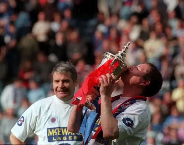 Framed Print : Glasgow Rangers footballer Paul Gascoigne kisses the trophy as he celebrates Rangers win Framed Print : Glasgow Rangers footballer Paul Gascoigne kisses the trophy as he celebrates Rangers win