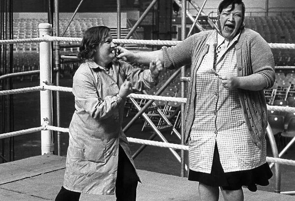 Two Glasgow women cleaners brawling in the boxing ring set up in Kelvin Hall for the big
