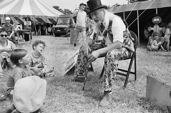 Glastonbury Festival 1994. General scenes. A wise old man entertains