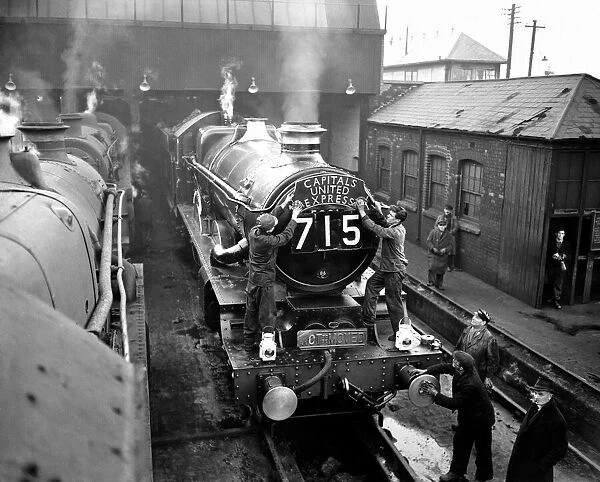 A gleaming ex-GWR Castle class loco gets its final attention from Cardiff Canton staff