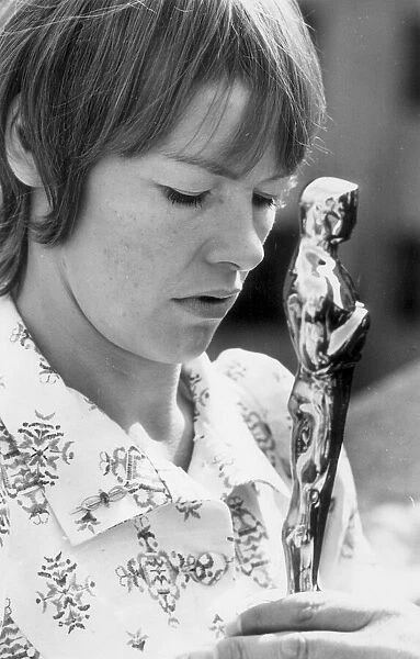Glenda Jackson holds her Oscar for best actress which was presented to her at a