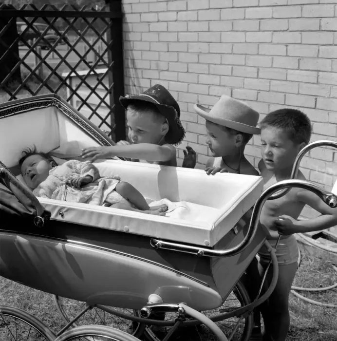 Framed Print : The three gloomy-faced triplet brothers all wearing cowboy hats leaning over the side of Framed Print : The three gloomy-faced triplet brothers all wearing cowboy hats leaning over the side of