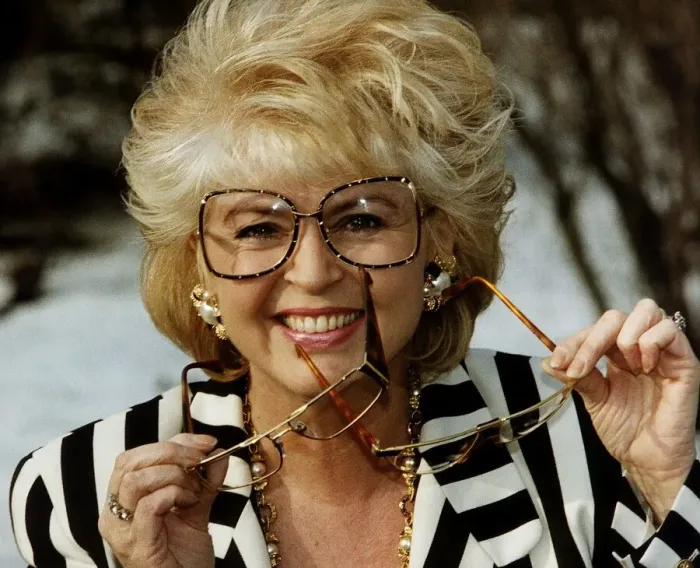 Framed Print : Gloria Hunniford TV Presenter holding glasses in hand voted spectacle wearer of the Year