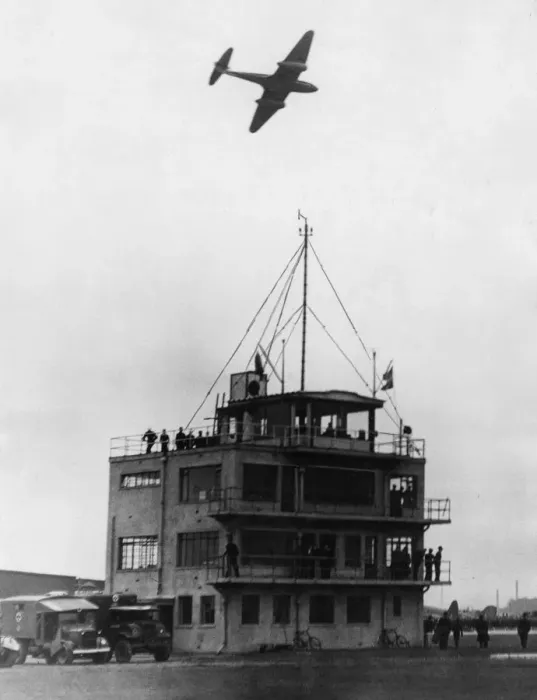 Framed Print : Gloster Meteor Aircraft passes over the Control Tower of Abbotsinch Airport, Paisley Framed Print : Gloster Meteor Aircraft passes over the Control Tower of Abbotsinch Airport, Paisley