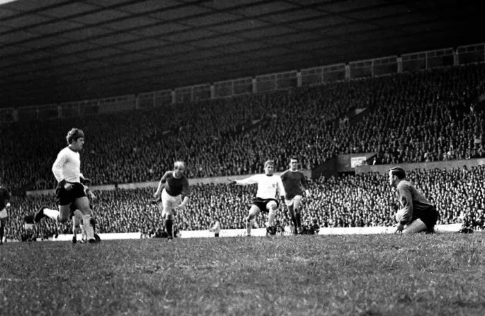 Framed Print : Goal scoring chance for Manchester United as Bobby Charlton rushes towards goal during Framed Print : Goal scoring chance for Manchester United as Bobby Charlton rushes towards goal during
