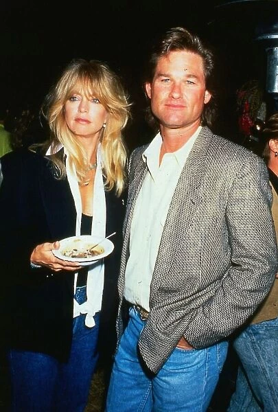 Goldie Hawn actress September 1992 Holding plate with Kurt Russell