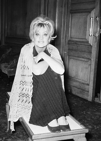 Goldie Hawn, American actress poses for pictures during press conference at The