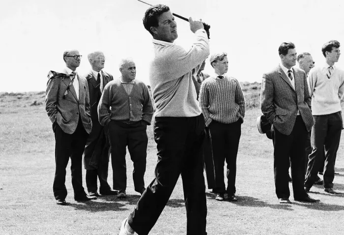 Framed Print : Golfer Peter Thomson playing from the fairway to the 13th hole in front of small group of Framed Print : Golfer Peter Thomson playing from the fairway to the 13th hole in front of small group of