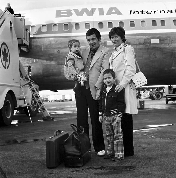 Golfer Tony Jacklin with his wife and two sons Warren aged 2 in his arms