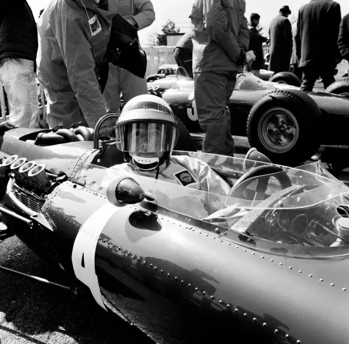 Framed Print : Goodwood International Race Meeting, Easter Monday. A driver in the main race