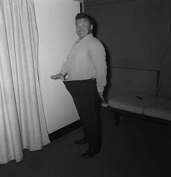 The 'Goon Show'funnyman Harry Secombe pictured in his dressing room t the BBC