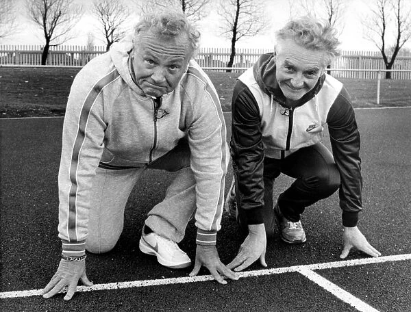 Former Goon Sir Harry Secombe is given a few tips from Steve Cram