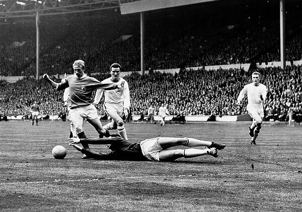 Gordon Banks dives at the feet of Denis Law in the FA Cup Final 1963 Manchester United