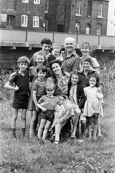 Gordon Gillick with his wife Victoria Gillick and their ten children at home in Wisbech