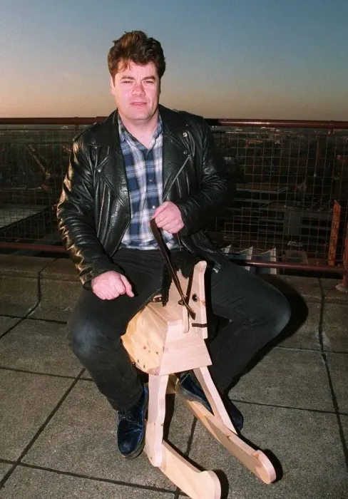 Framed Print : Gordon Kennedy TV Presenter of the National Lottery - sitting on a rocking horse Framed Print : Gordon Kennedy TV Presenter of the National Lottery - sitting on a rocking horse