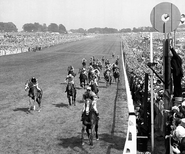 Gordon Richards crosses the finishing line on Pinza at the Epsom Derby