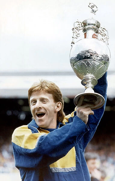 Gordon Strachan of Leeds United holding the First Division league trophy. May 1992
