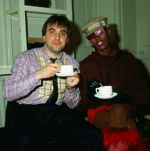 Grace Jones drinking tea with Billy Sloan April 1983