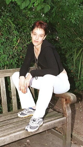 Grace Peters illigitimate daughter of Keith Allen July 1999 sitting on a bench