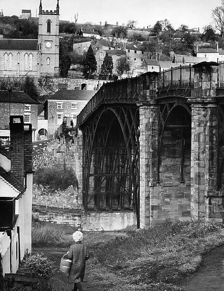 The graceful span of the original iron bridge over the Severn in Ironbridge, Shropshire